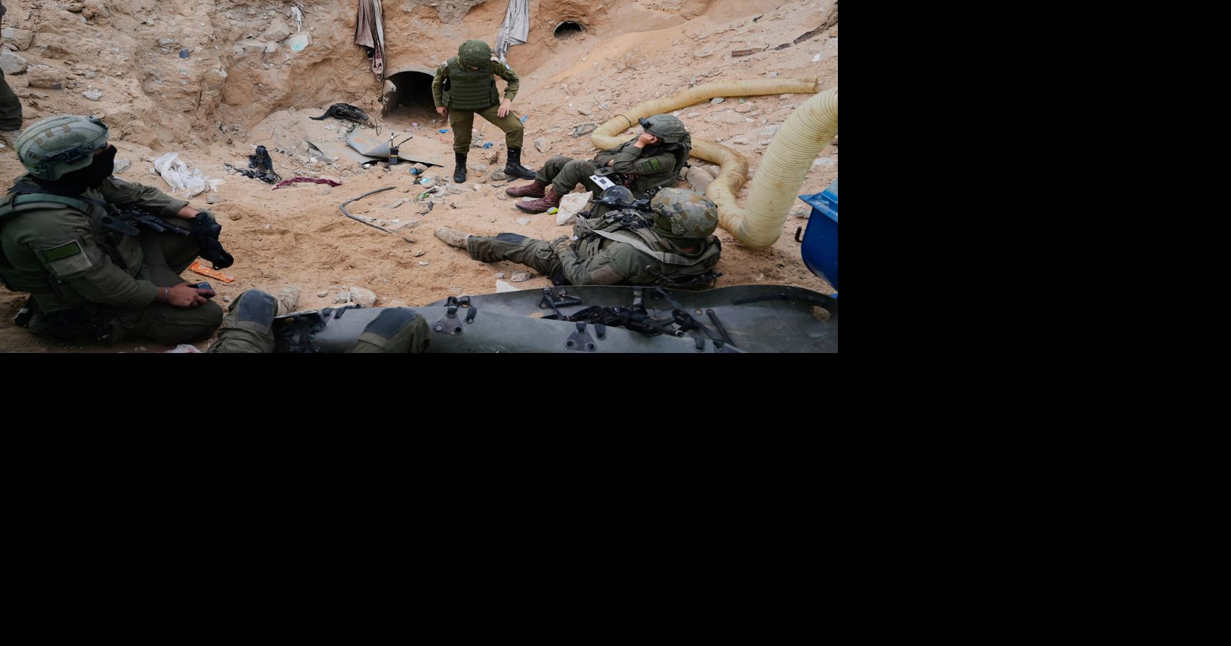 Israeli army takes journalists into a tunnel in a Gaza city it seized, largely flattened