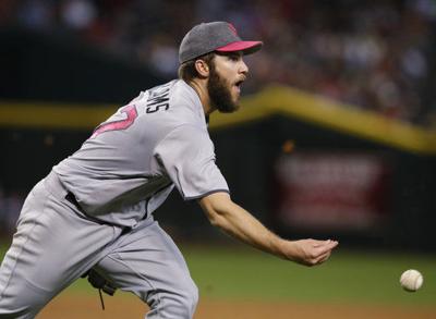 D-Backs' Chris Iannetta hit in face by pitch