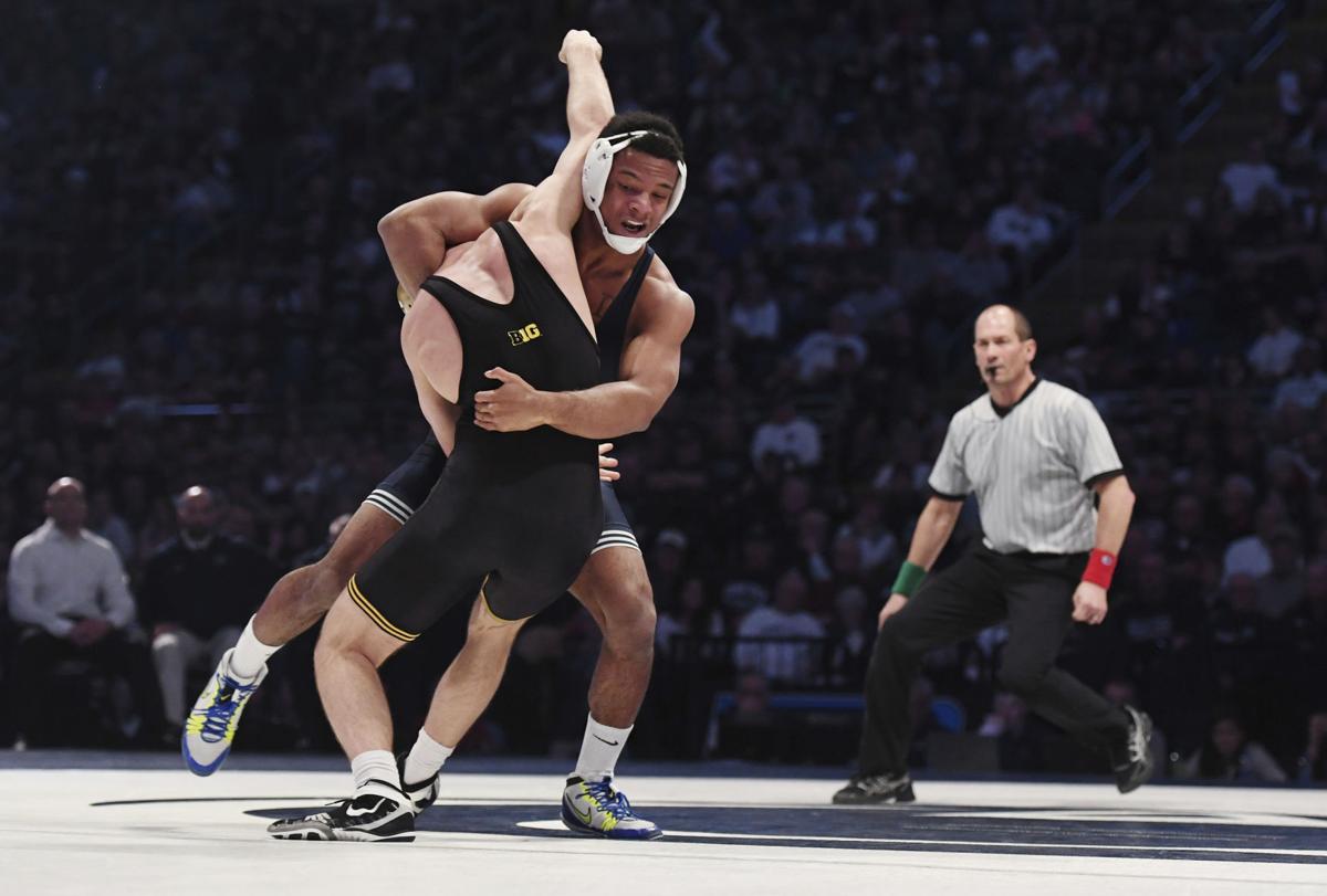 Wrestling Penn State defeats Iowa in front of record crowd Sports