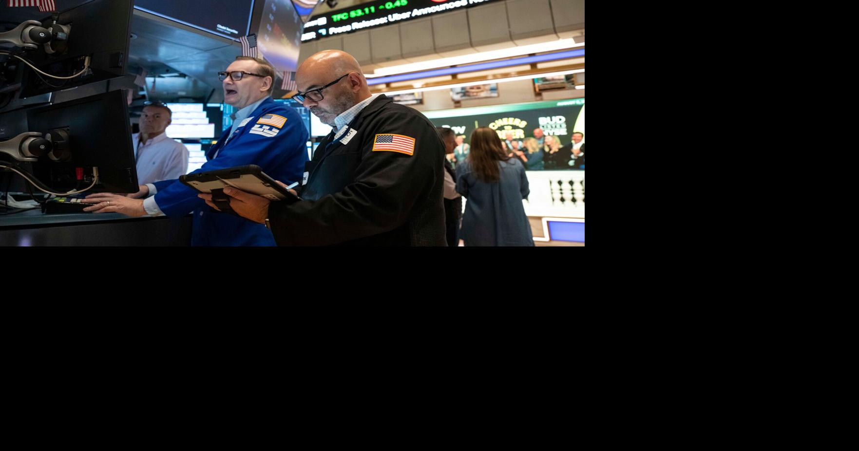 Stocks edge lower as oil prices rise, more earnings reports roll in