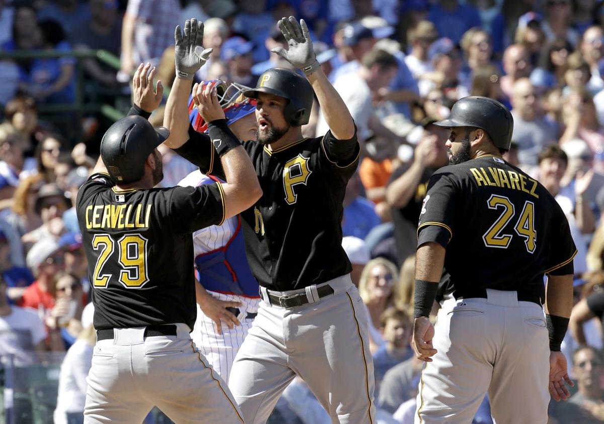 Pittsburgh Pirates Pedro Alvarez tosses his bat and walks to first