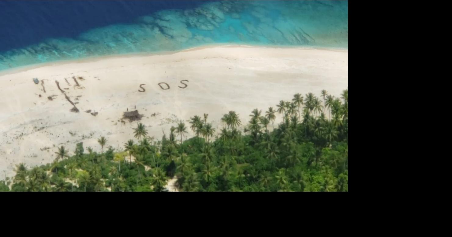 'SOS in the sand': Airman's photos helped lead to rescue of men ...
