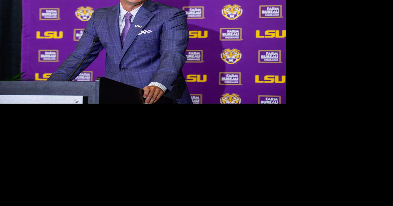 Louisiana State coach Lane Kiffin announces that defensive coordinator Blake Baker will remain with the Tigers