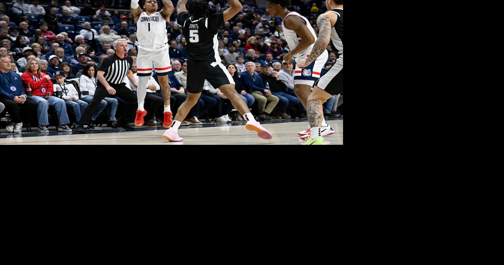 No. 2 Connecticut improves to 10-0 in Big East after topping Providence behind Reed's late flurry