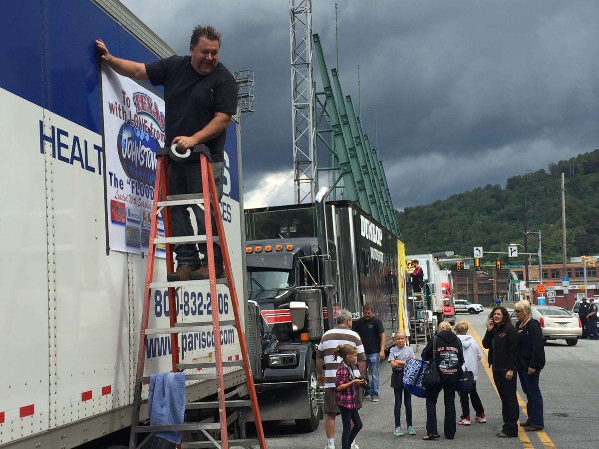 Watch Video Big Rigs Filled With Flood Relief Supplies Leave