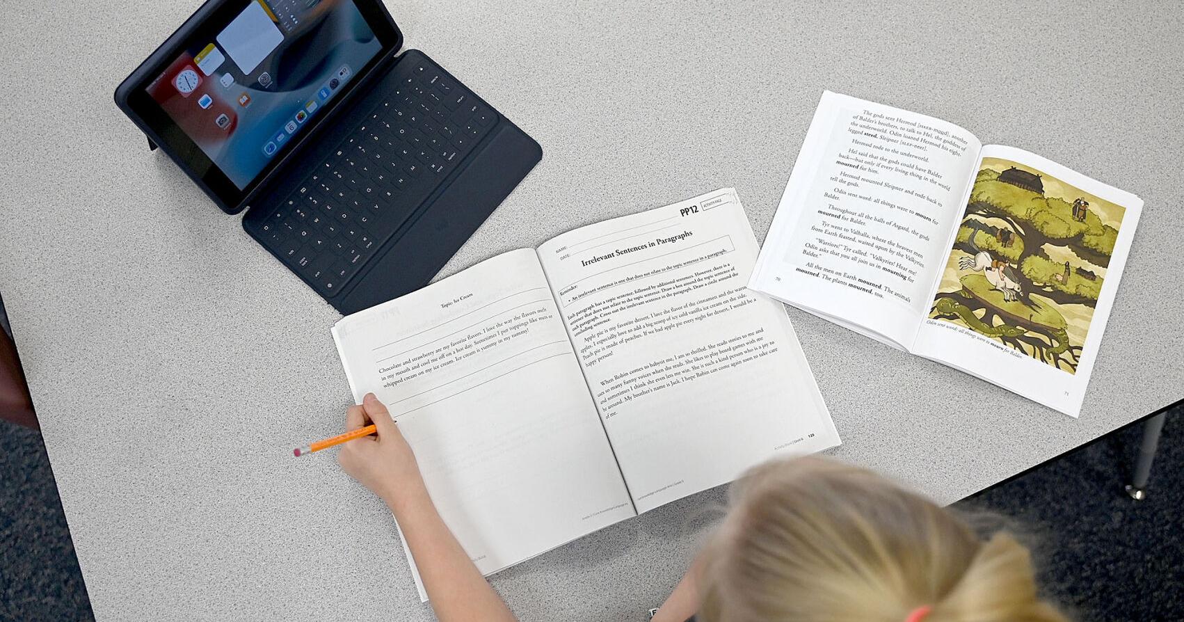 Free textbook law raises questions for schools - Vimarsana News