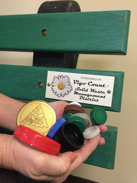 Recycled bottle caps form plastic bench   es for schools 