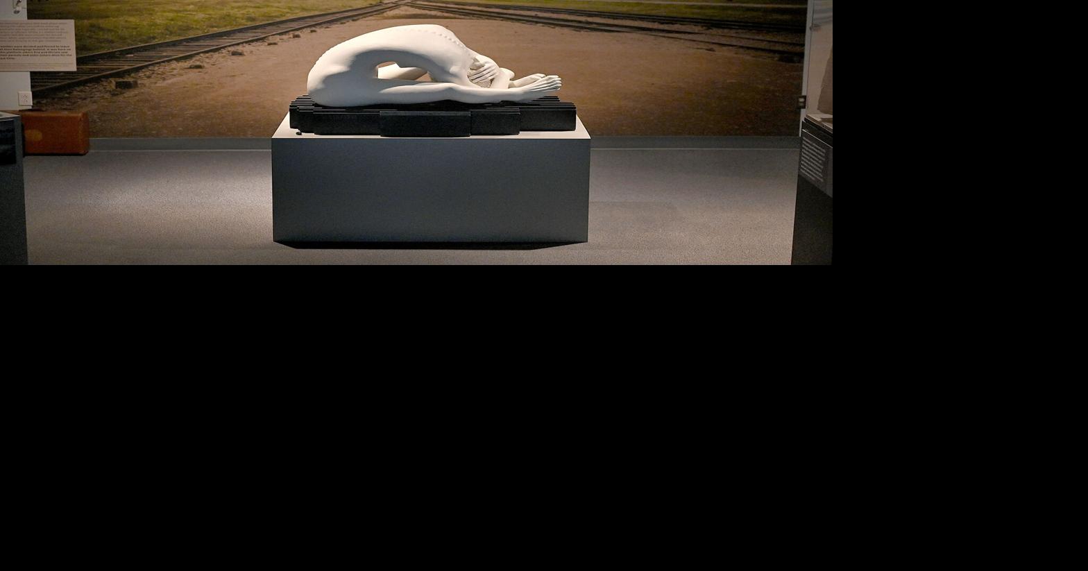 CANDLES sculpture pays tribute to artist's mother, who perished at