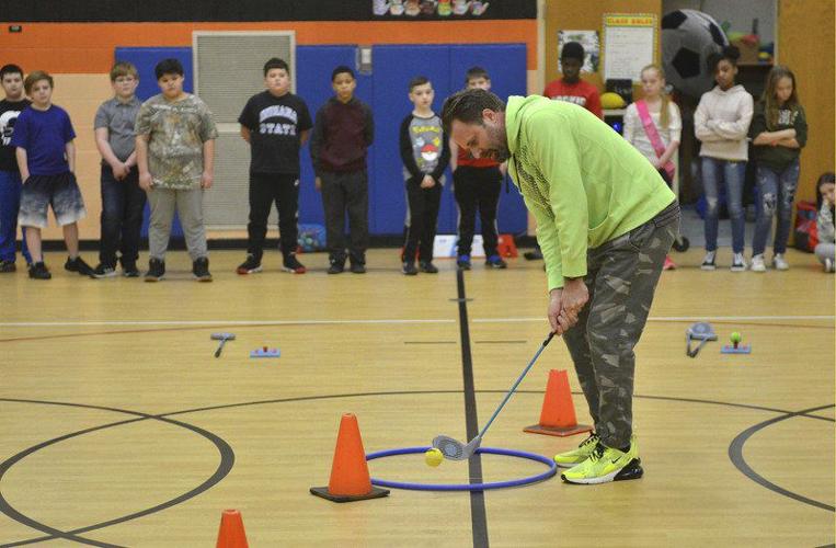 Fore! 'First Tee' program introduces school children to golf Local