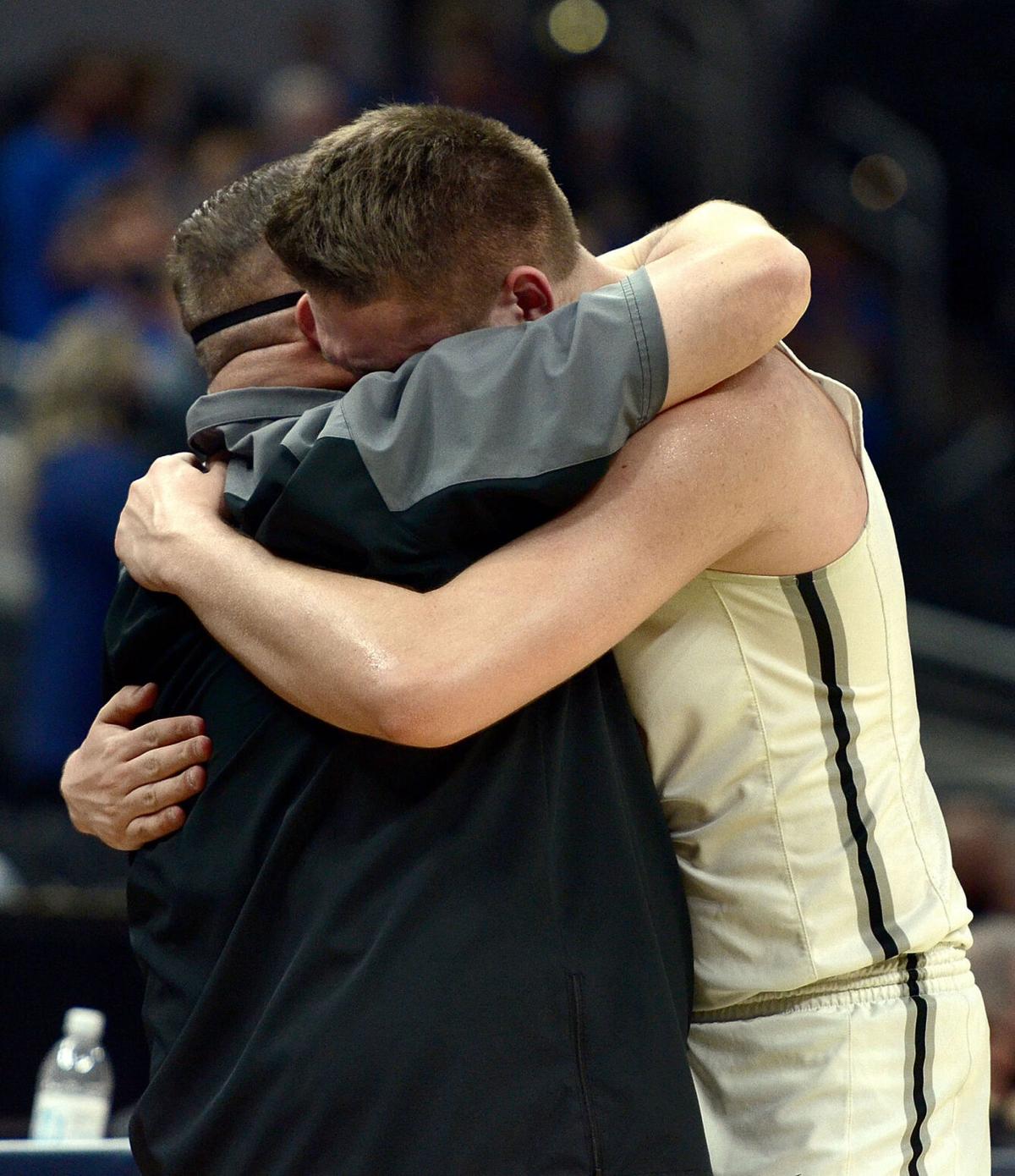 SPT 040321 PH DAVIS SCHELSKY HUG