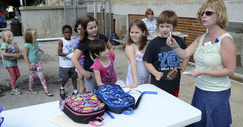 Health center gives away bikes, backpacks at open house day before ...