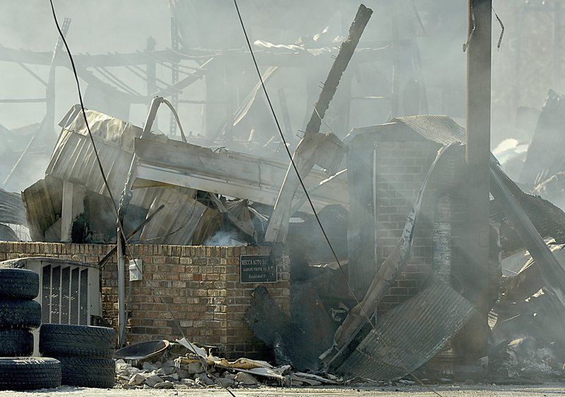 Cause unknown in massive fire at Mecca business Local News