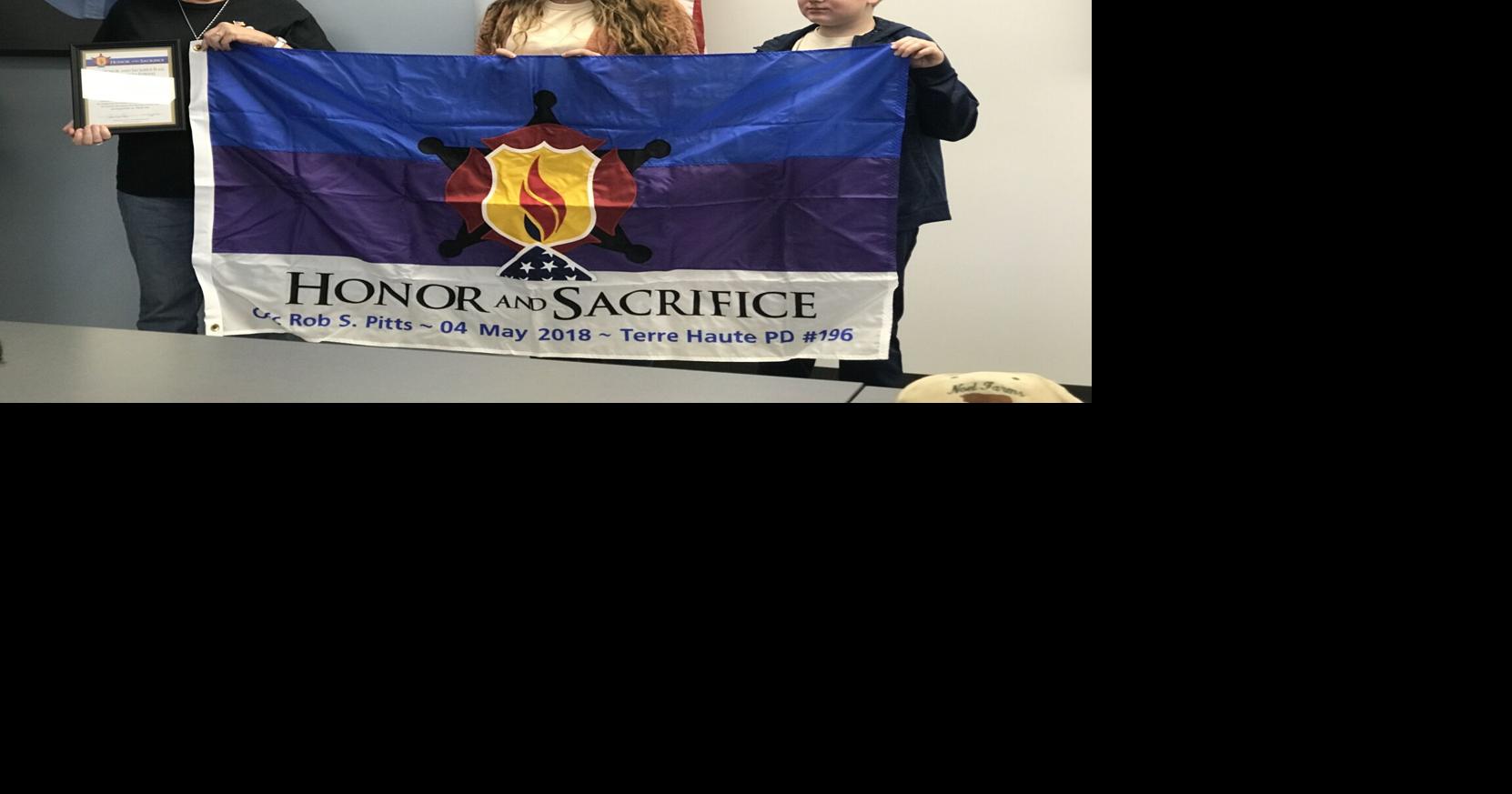 Honor & Sacrifice Families of fallen officers receive flags Local
