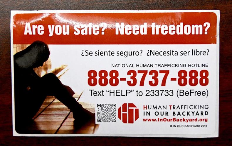 No one is for sale': Banner drop marks National Human Trafficking Awareness Month - Local News - tribstar.com