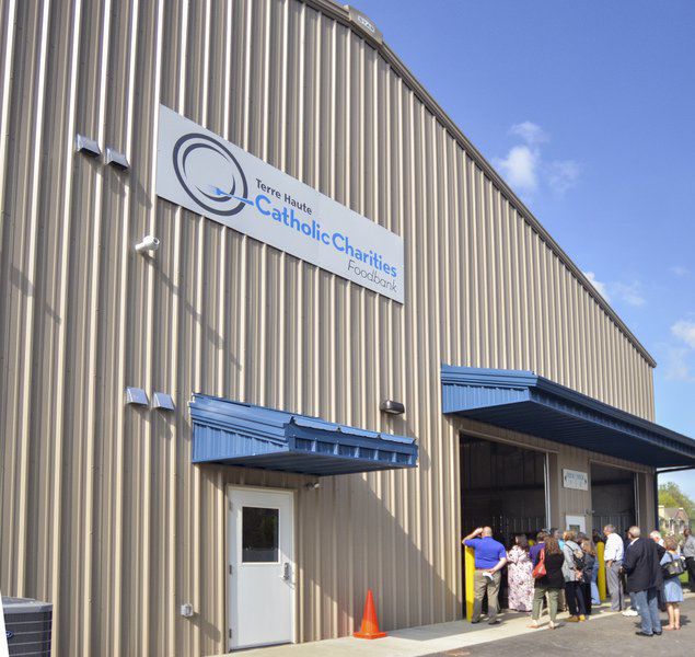 Catholic Charities Opens Blesses New Food Bank Building Local