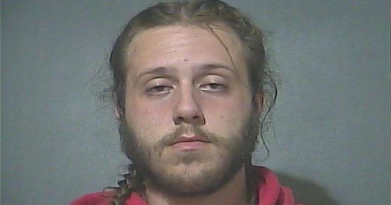 Man passed out in running car with gun in lap arrested | Local News ...