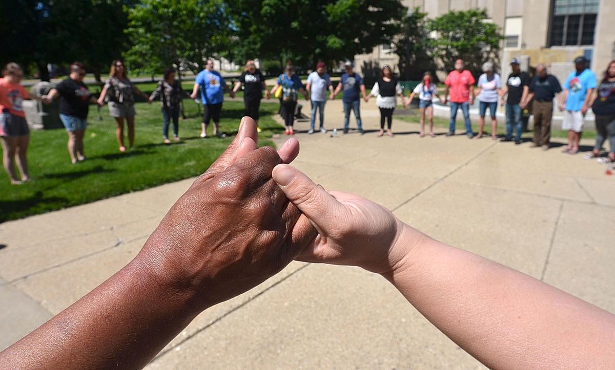 MET 053020 FLOYD PRAYER HANDS