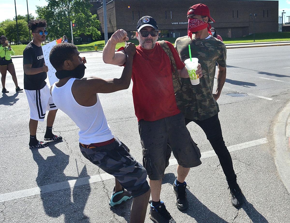 MET 053020 FLOYD PROTEST PUNCH