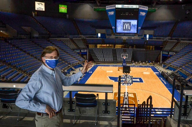 Hulman Center's basketball floor to sport new luster after being stripped  to bare wood, Local News