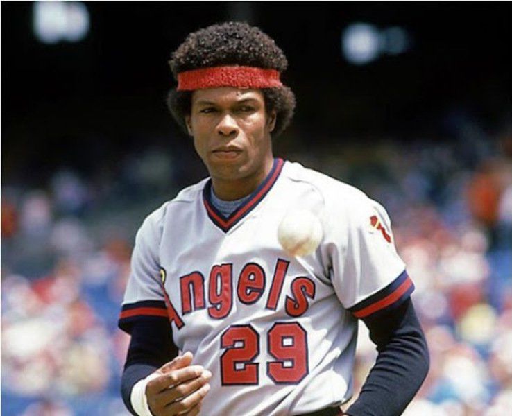 Minnesota Twins second baseman Rod Carew and his 19-month old