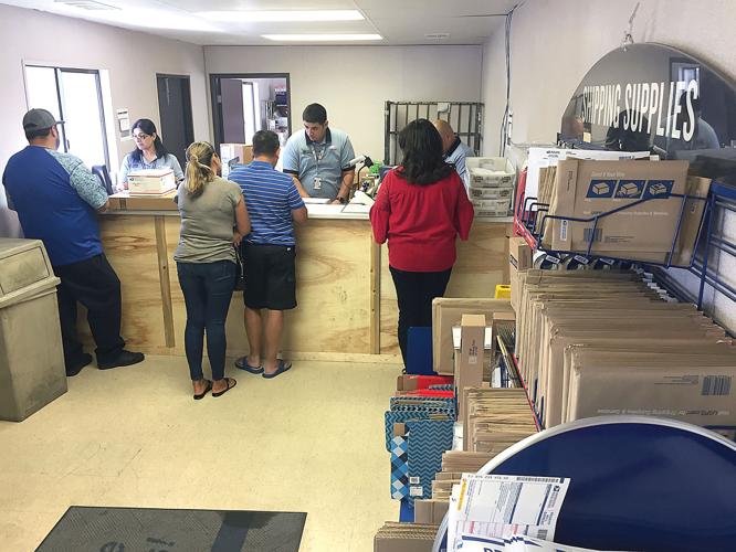 Post office to remain in temporary quarters for another month Tracy