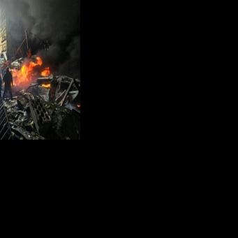 In the heart of Beirut, buildings in flames and charred cars