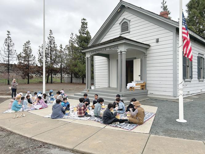 Students learn through living history project Tracy Press