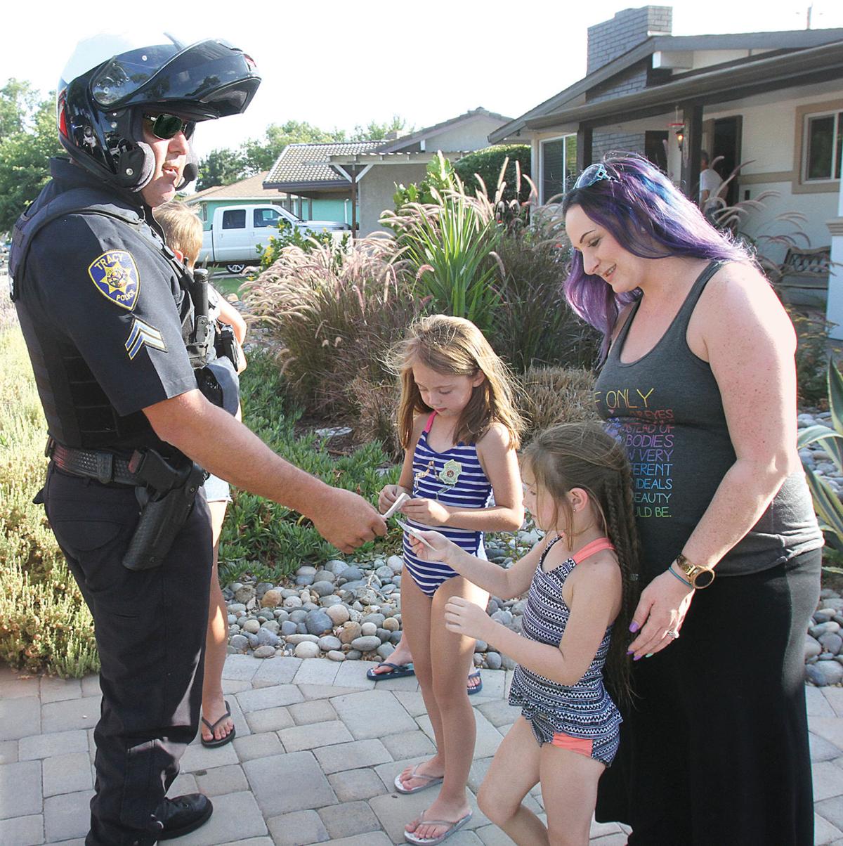Neighbors Band Together Against Crime At National Night Out