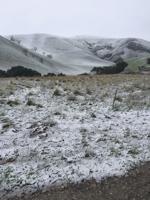 Cold weather brings dusting of snow to hills