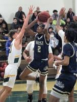 Boys basketball: Wolf Pack ball out in rivalry win over the 'Dogs
