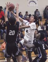 Boys basketball: Mustangs hand the Wolf Pack their first loss of the season