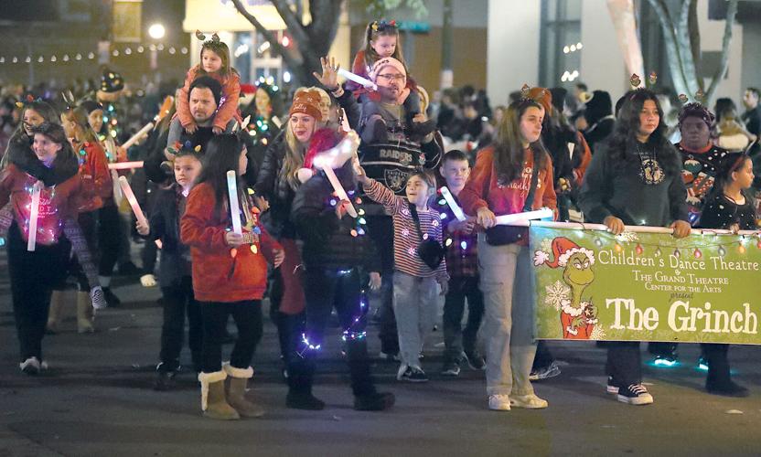 Thousands gather to watch holiday light parade, tree lighting in