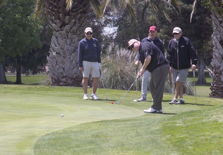 Tracy family hosts golf benefit
