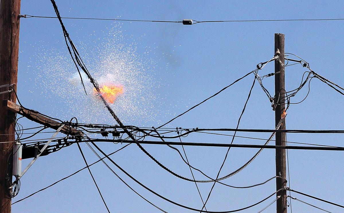 Power line catches fire, creates downtown hazard Tracy Press News