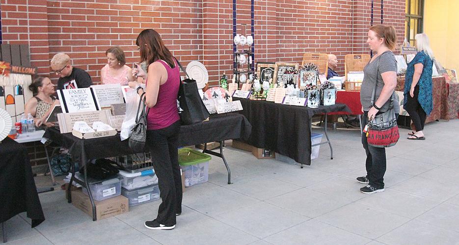 Crowd savors wine stroll Tracy Press Our Town