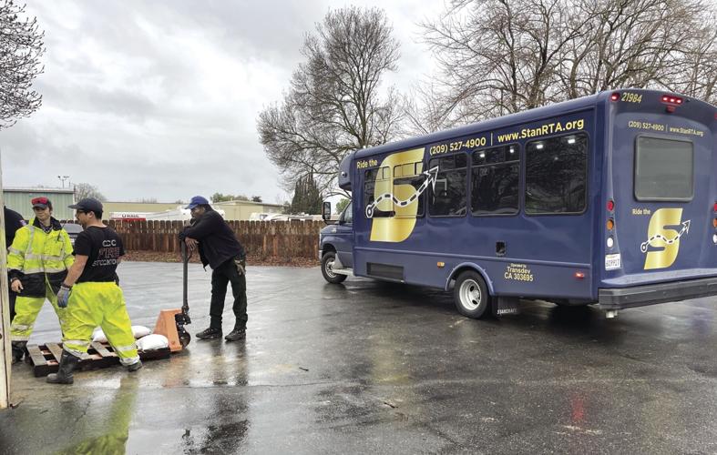 Local bus drivers assist in the evacuation of nursing home residents