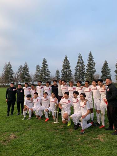 Boys’ soccer win tourney crown at Pitman; girls place fourth at Sierra
