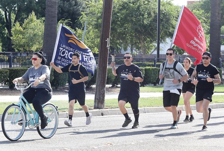 Special Olympics Law Enforcement Torch Run passes through Tracy | Tracy ...