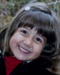 Thousands mourn youngest who died