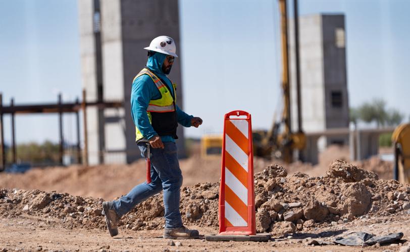 Construction workers make progress on what will be the Mattel Adventure Park in Glendale on March 21, 2025.
