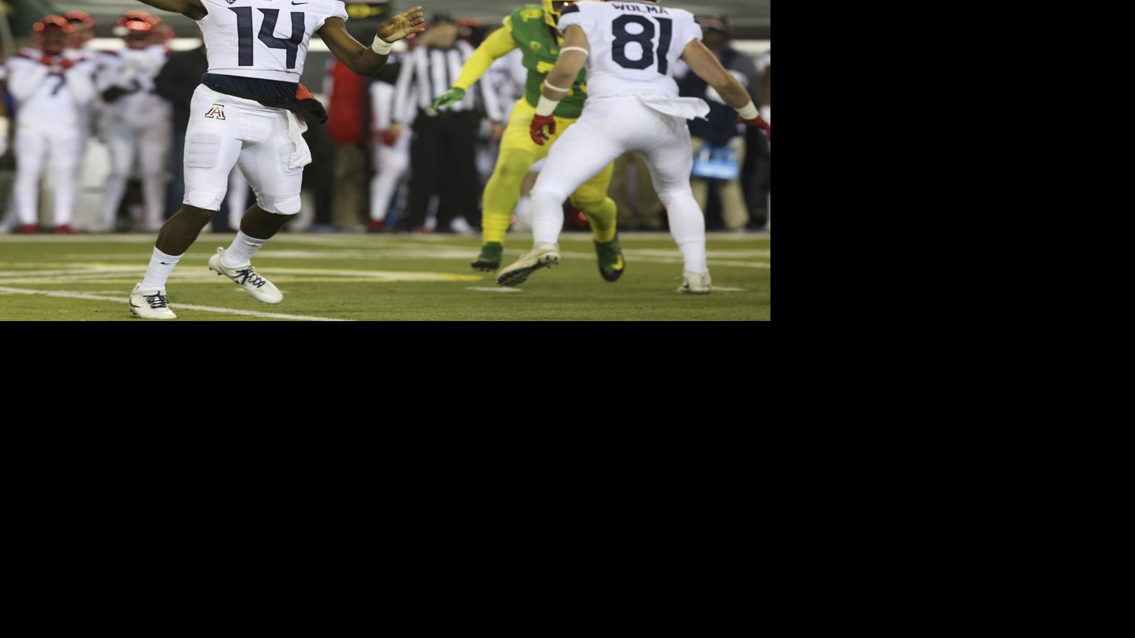 Oregon quarterback Justin Herbert warms up before the the team's NCAA  college football game against Arizona on Saturday, Nov. 18, 2017, in  Eugene, Ore. Herbert has been out with an injury. (AP