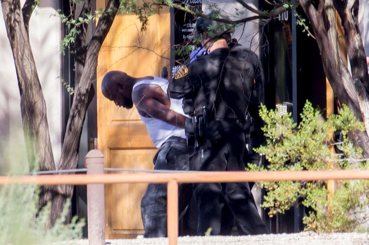 Barricaded man near 1st and River