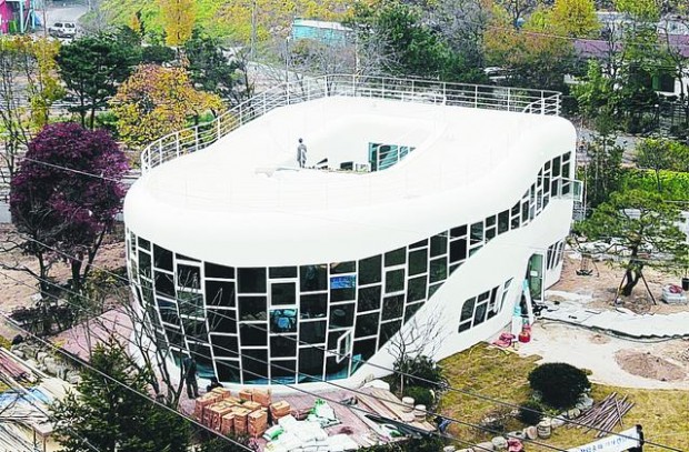 Toilet house fulfills dream for beautifier of public restrooms  