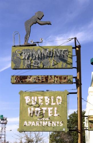Old sign comes down for fix-up    