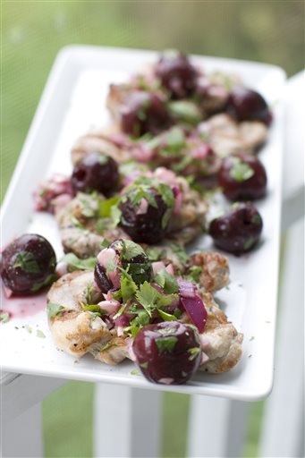 Pork with a fresh take on salsa _ grilled cherries