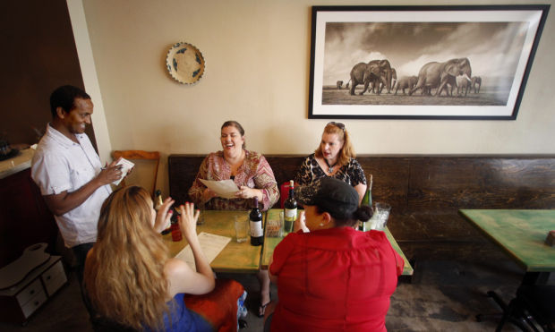 Ethiopian dishes, refugee aid served    