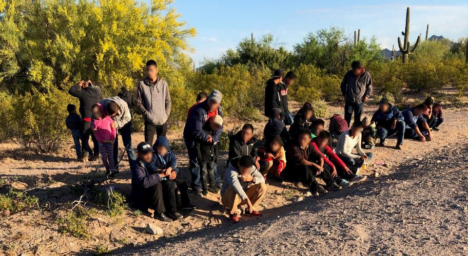Migrants surrender to Border Patrol agents near Lukeville on April 16