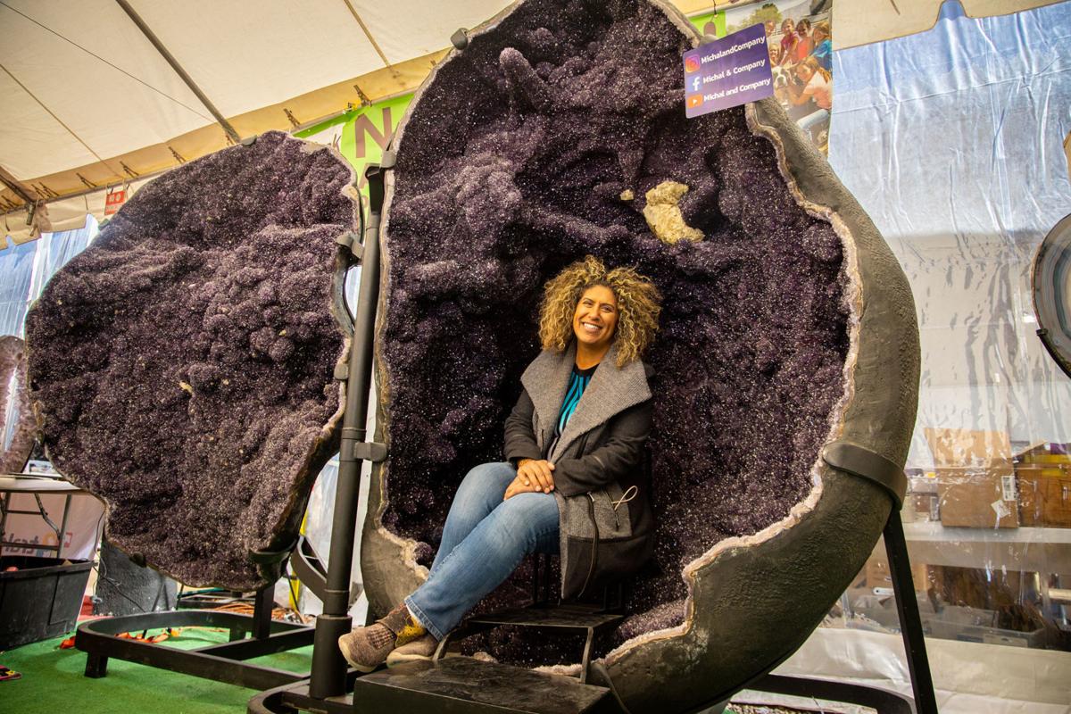 Sit inside an amethyst geode with a baby goat at this Tucson gem show