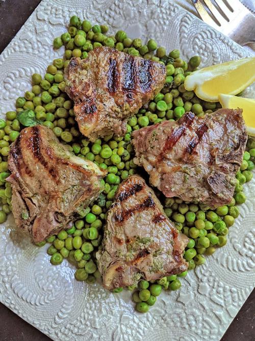 Lamb cooks quickly on the grill, and pairs well with a minty pea salad. ( Gretchen McKay/Pittsburgh Post-Gazette/ TNS.