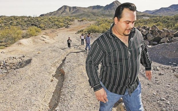 Lot owners want county to fix mess at Enclaves  